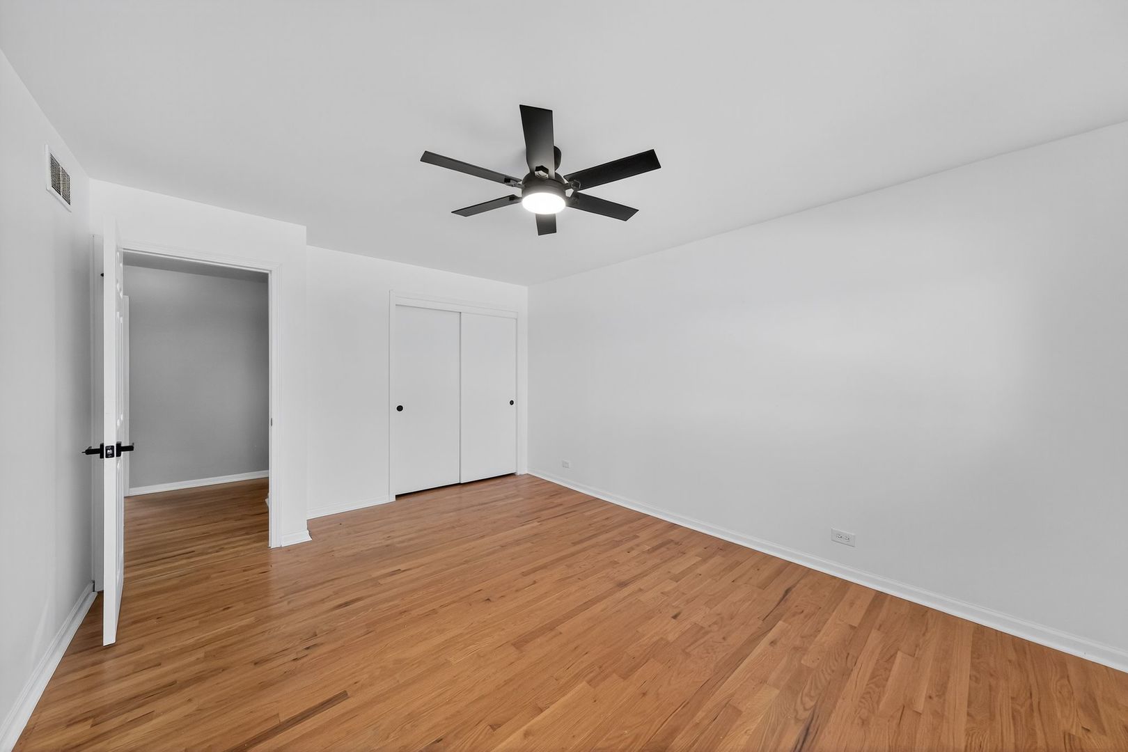7501 Cambridge Road Darien, IL 60561 - Photo 17 of 22 wooden floor in an empty room