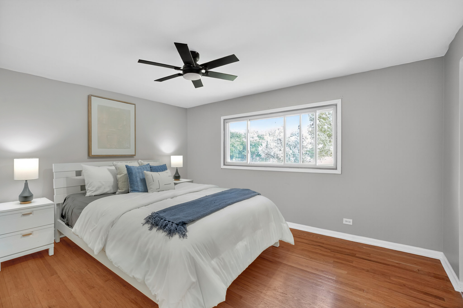 7501 Cambridge Road Darien, IL 60561 - Photo 18 of 22 a bed room with a bed and a window