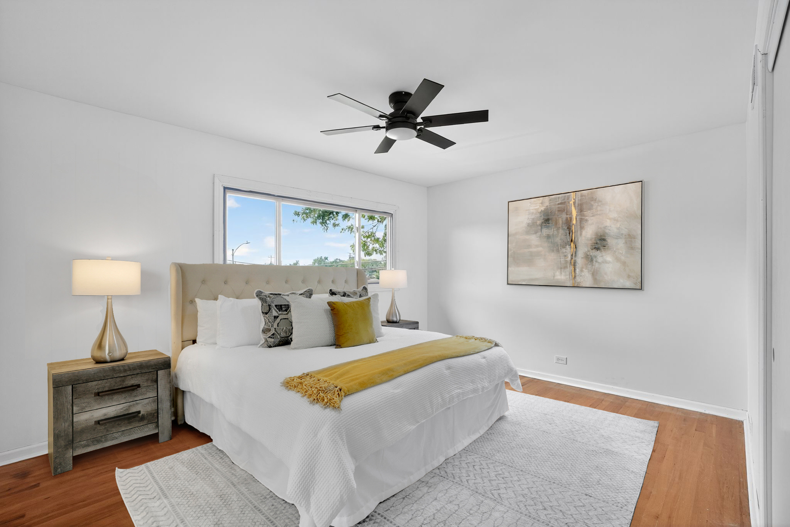 7501 Cambridge Road Darien, IL 60561 - Photo 21 of 22 a bedroom with a bed and a painting on the wall