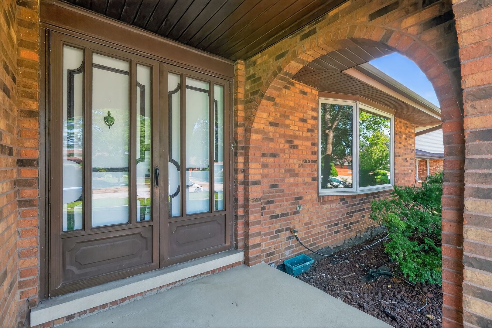7501 Cambridge Road Darien, IL 60561 - Photo 7 of 22 a view of front door of house