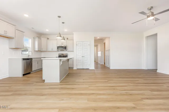 a view of kitchen with wooden floor