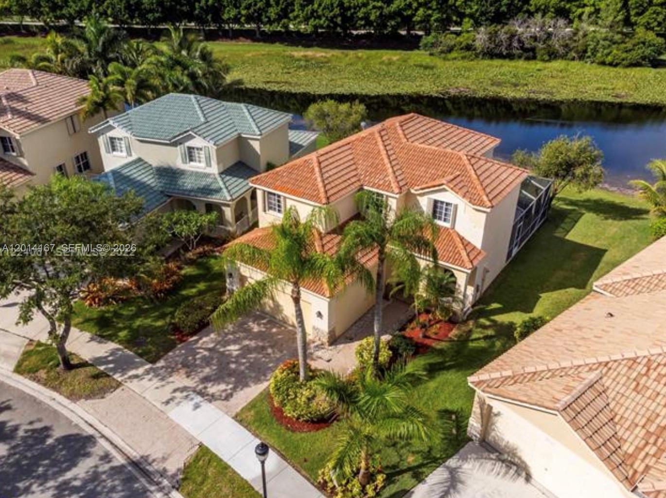 618 Willow Bend Road, Unit 618 Weston, FL 33327 - Photo 1 of 9 an aerial view of a house with a lake view