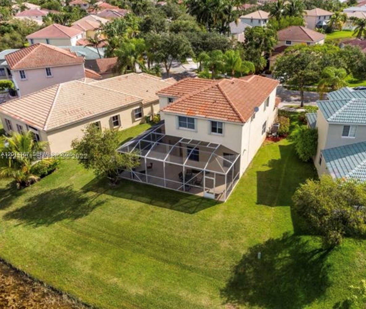 618 Willow Bend Road, Unit 618 Weston, FL 33327 - Photo 9 of 9 an aerial view of a house with a garden