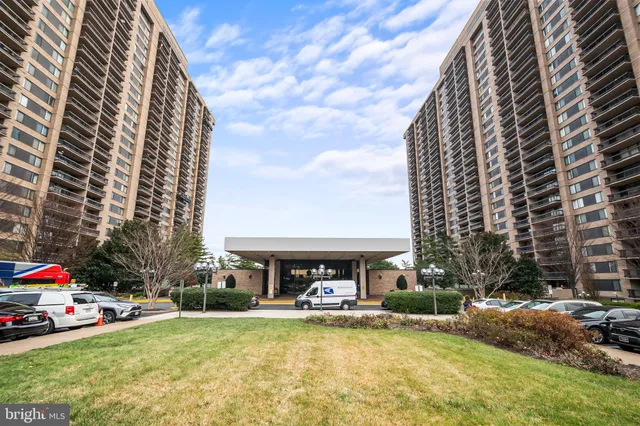 a view of house with outdoor space and swimming pool