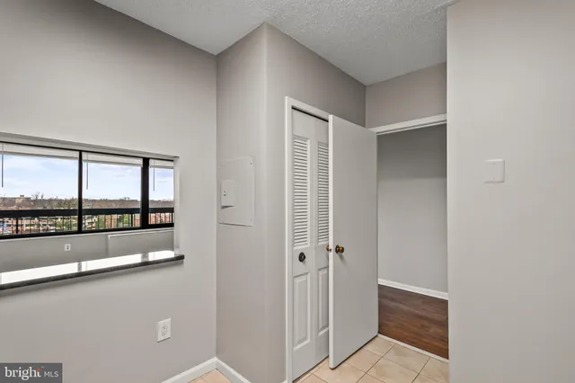 a view of a bathroom with a tub and window