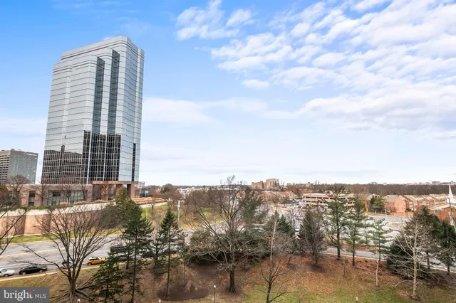 a view of a city with tall buildings