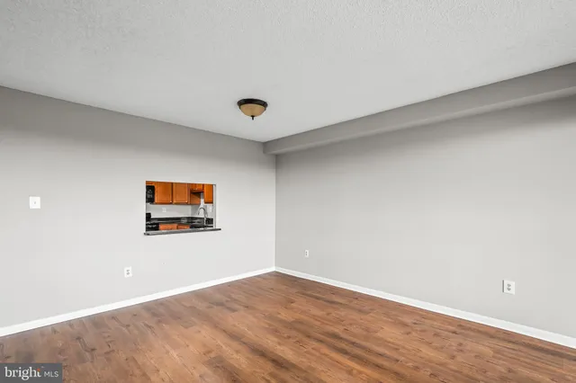 a view of a room with a flat screen tv