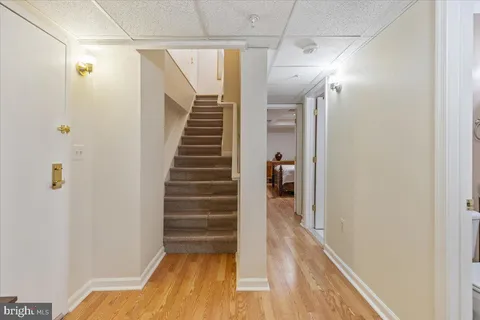 a view of entryway with wooden floor