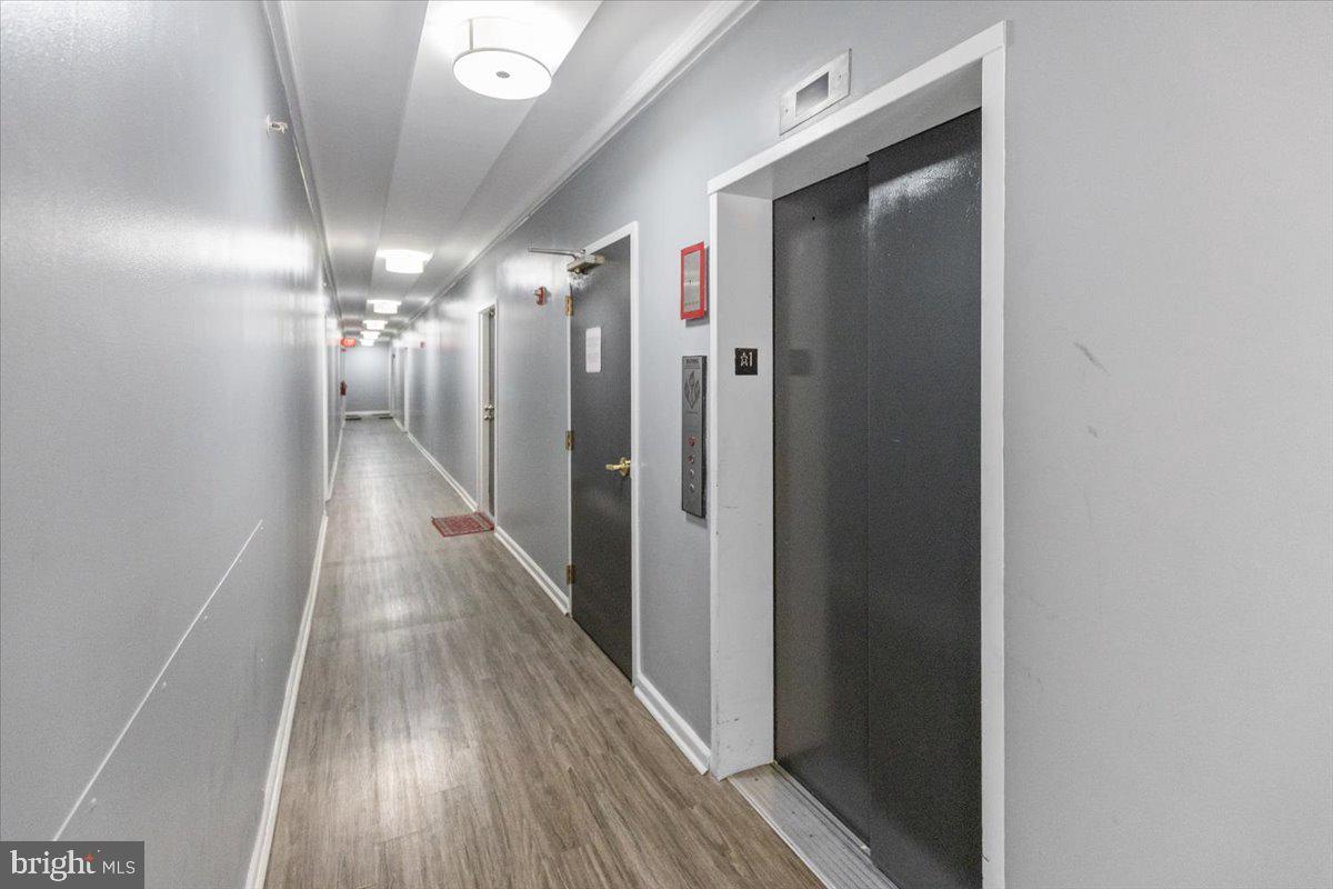 1458 Columbia Road Northwest, Unit 105 Washington, DC 20009 - Photo 26 of 39 a view of gallery with hallway