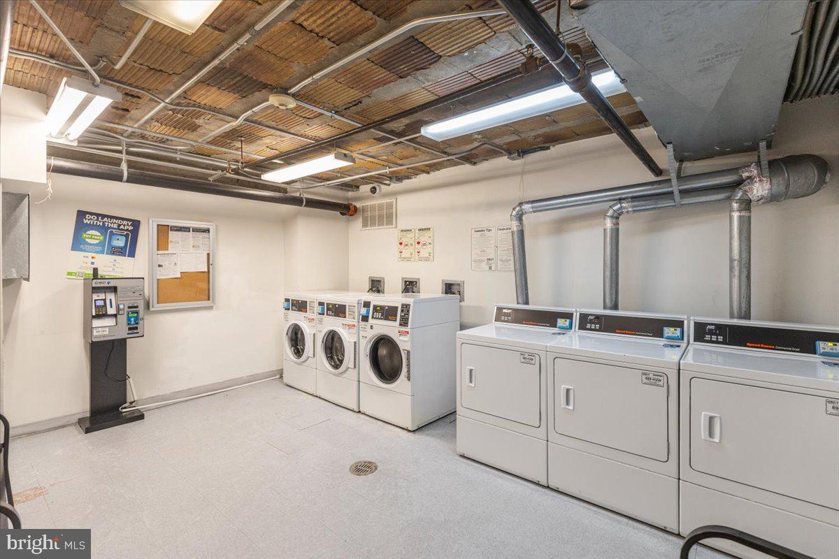 1458 Columbia Road Northwest, Unit 105 Washington, DC 20009 - Photo 28 of 39 a utility room with dryer and washer