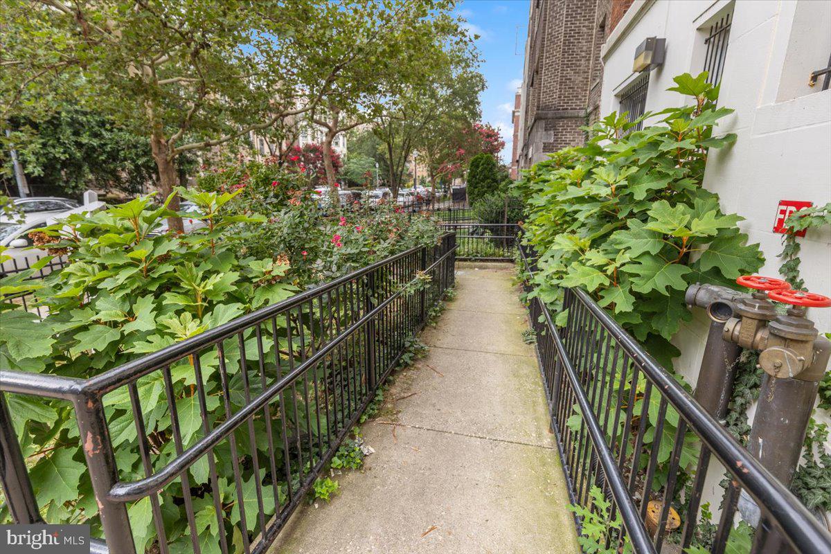 1458 Columbia Road Northwest, Unit 105 Washington, DC 20009 - Photo 34 of 39 a view of a pathway with an outdoor space
