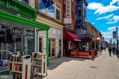 a view of street with sitting area