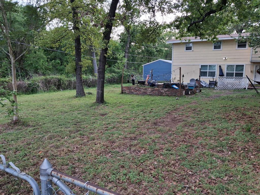 304 Ridgewood Drive Tool, TX 75143 - Photo 2 of 12 View of grassy yard