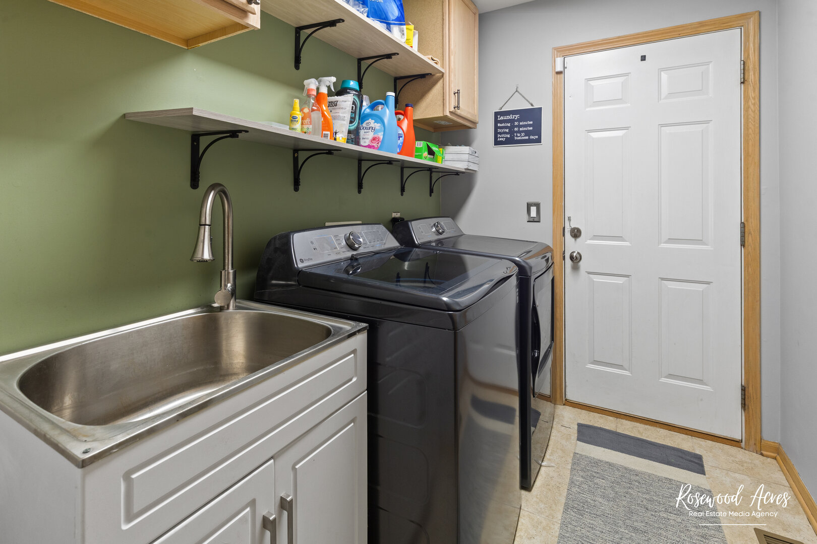 840 Peony Lane Bourbonnais, IL 60914 - Photo 16 of 30 a kitchen with a sink and a refrigerator