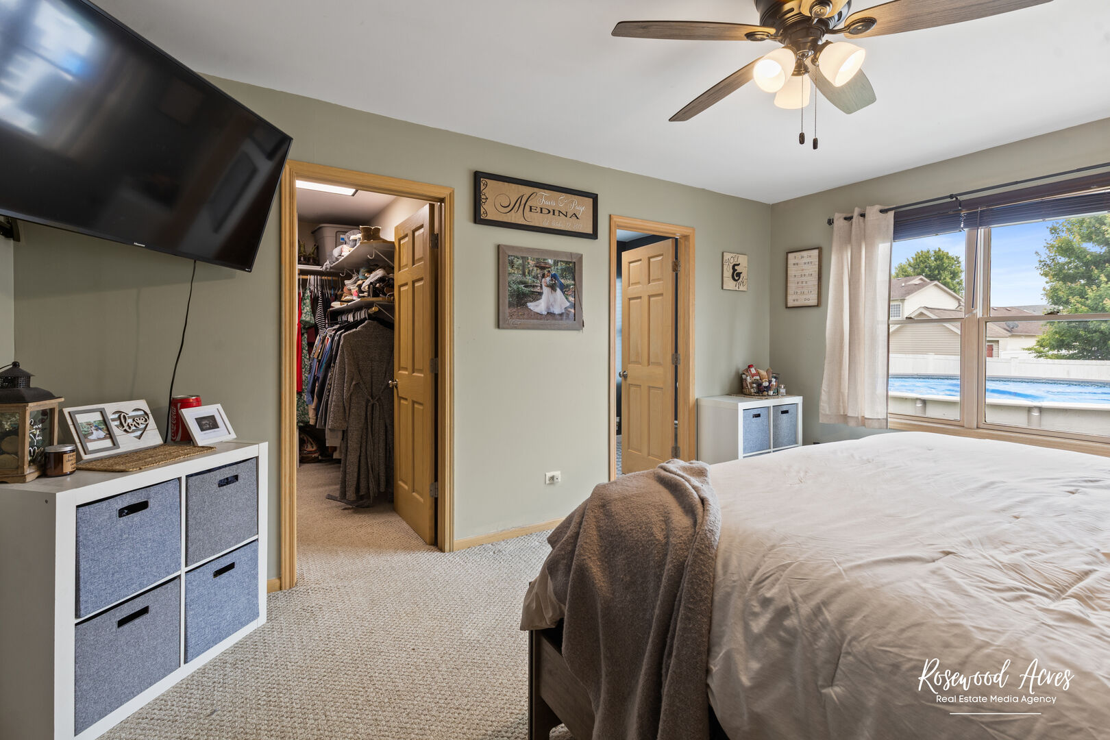 840 Peony Lane Bourbonnais, IL 60914 - Photo 18 of 30 a bedroom with a bed and a chandelier