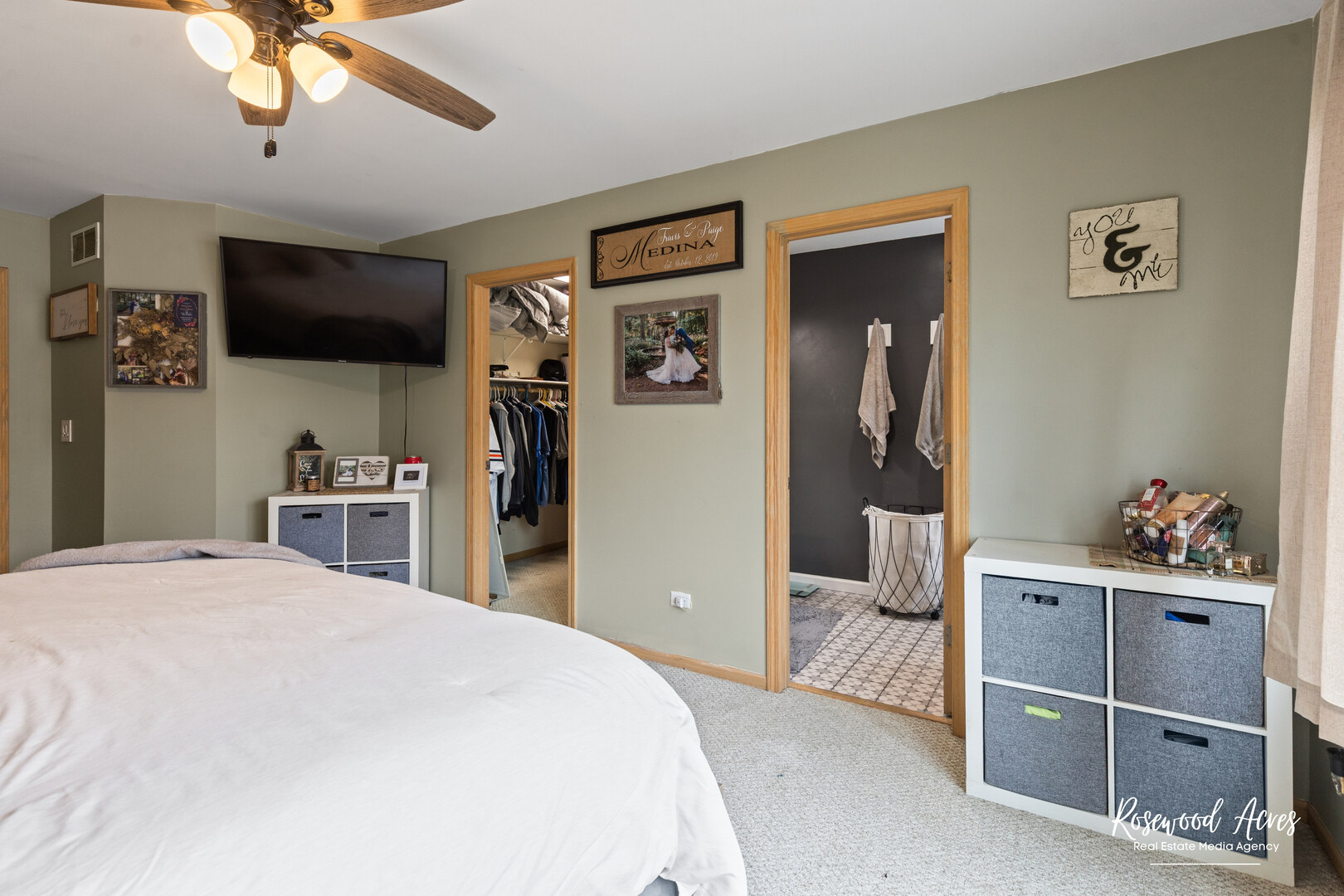 840 Peony Lane Bourbonnais, IL 60914 - Photo 19 of 30 a bedroom with a bed and a flat screen tv