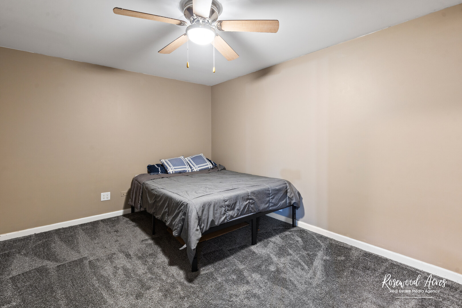 840 Peony Lane Bourbonnais, IL 60914 - Photo 26 of 30 a bedroom with a bed and a chandelier fan