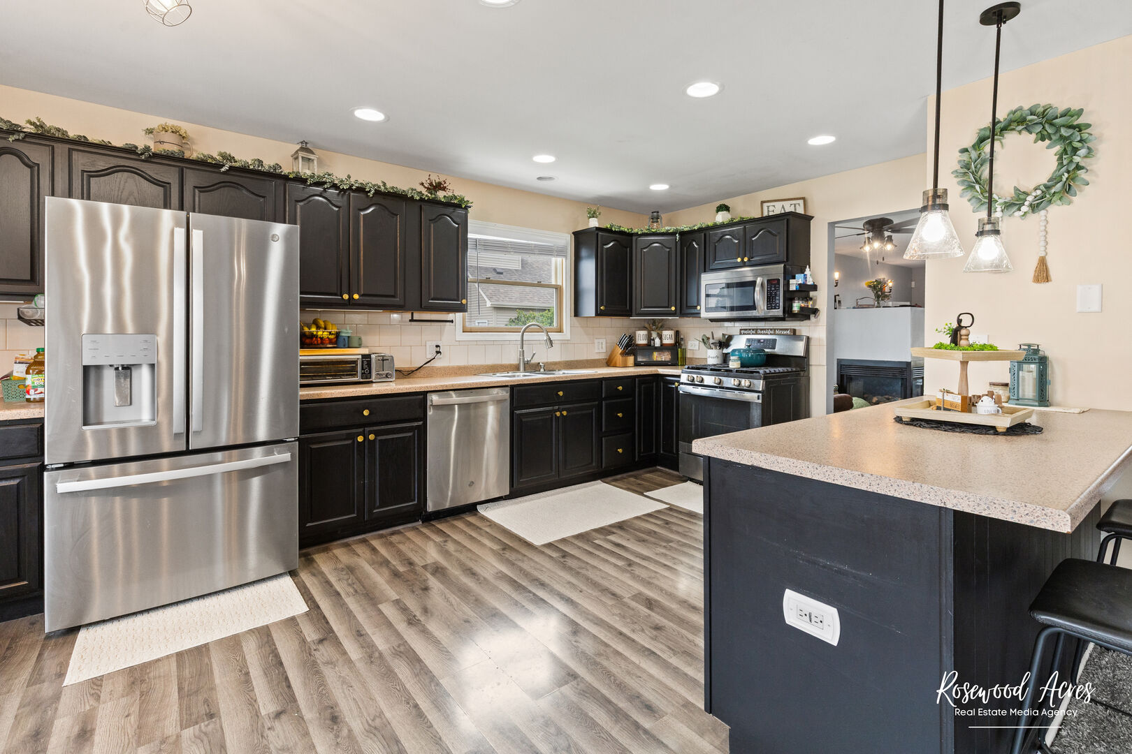 840 Peony Lane Bourbonnais, IL 60914 - Photo 10 of 30 a kitchen with stainless steel appliances a sink stove refrigerator and cabinets
