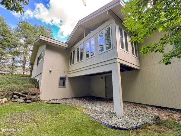 a view of a lake with a yard