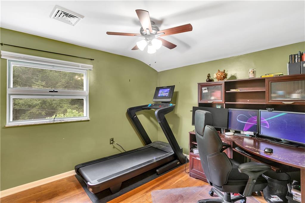 200 Evans City Road Freedom, PA 15042 - Photo 23 of 37 a room with furniture and a projector