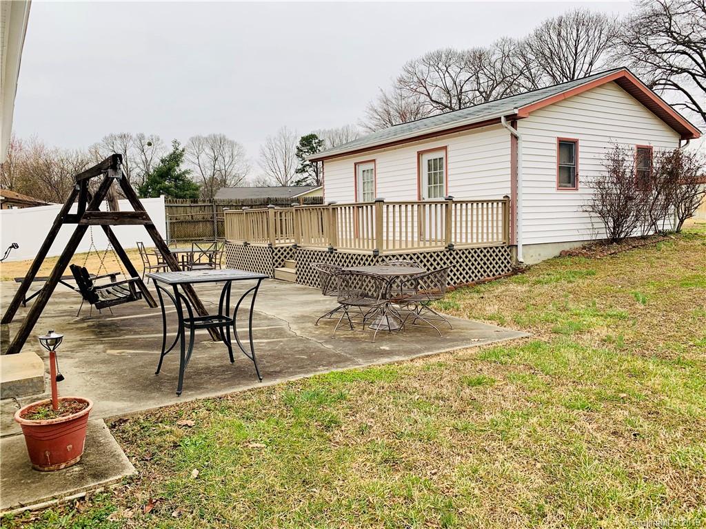 220 Pine Valley Road Salisbury, NC 28147 - Photo 26 of 29 a view of a house with backyard and sitting area