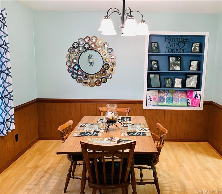220 Pine Valley Road Salisbury, NC 28147 - Photo 6 of 29 a view of a dining room with furniture and chandelier