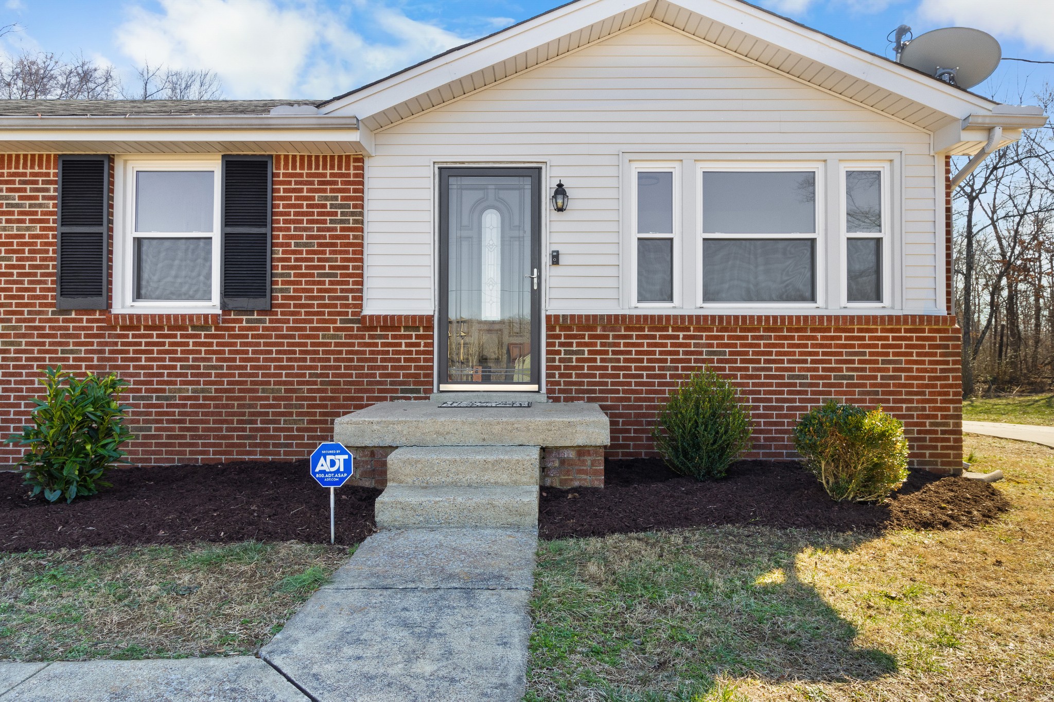 1402 Southside Road Southside, TN 37171 - Photo 3 of 24 a view of brick house with potted plants