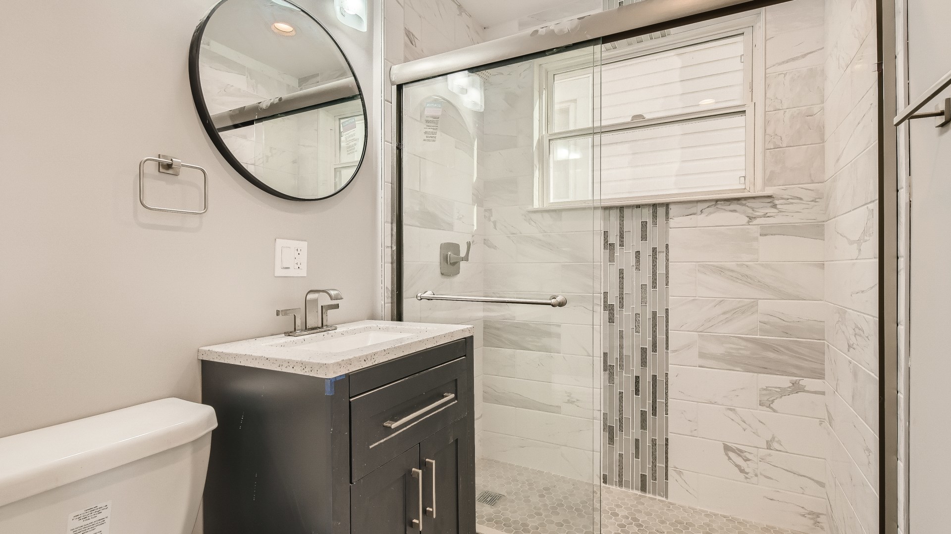 2209 North Kilpatrick Avenue Chicago, IL 60639 - Photo 12 of 22 a bathroom with a sink toilet and a mirror