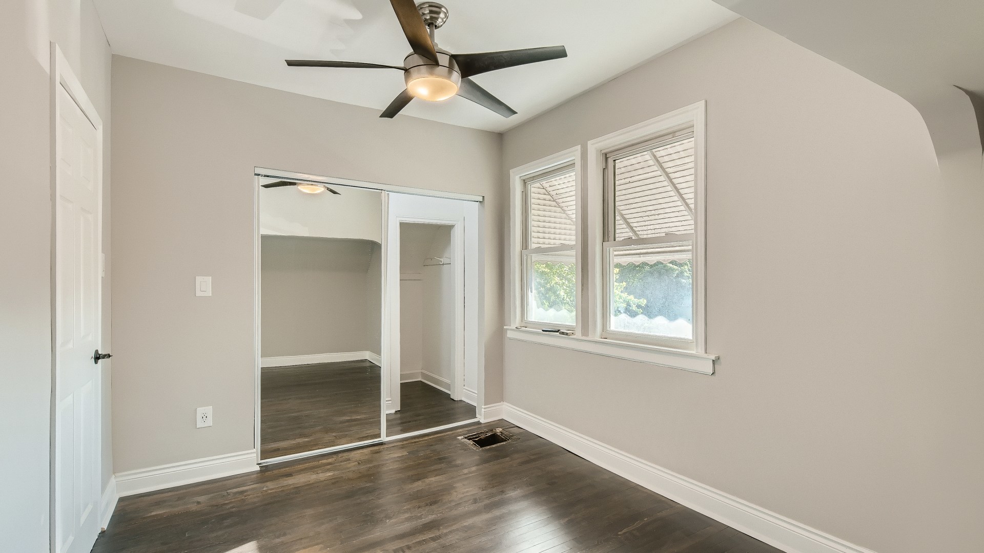 2209 North Kilpatrick Avenue Chicago, IL 60639 - Photo 14 of 22 wooden floor in an empty room with a window