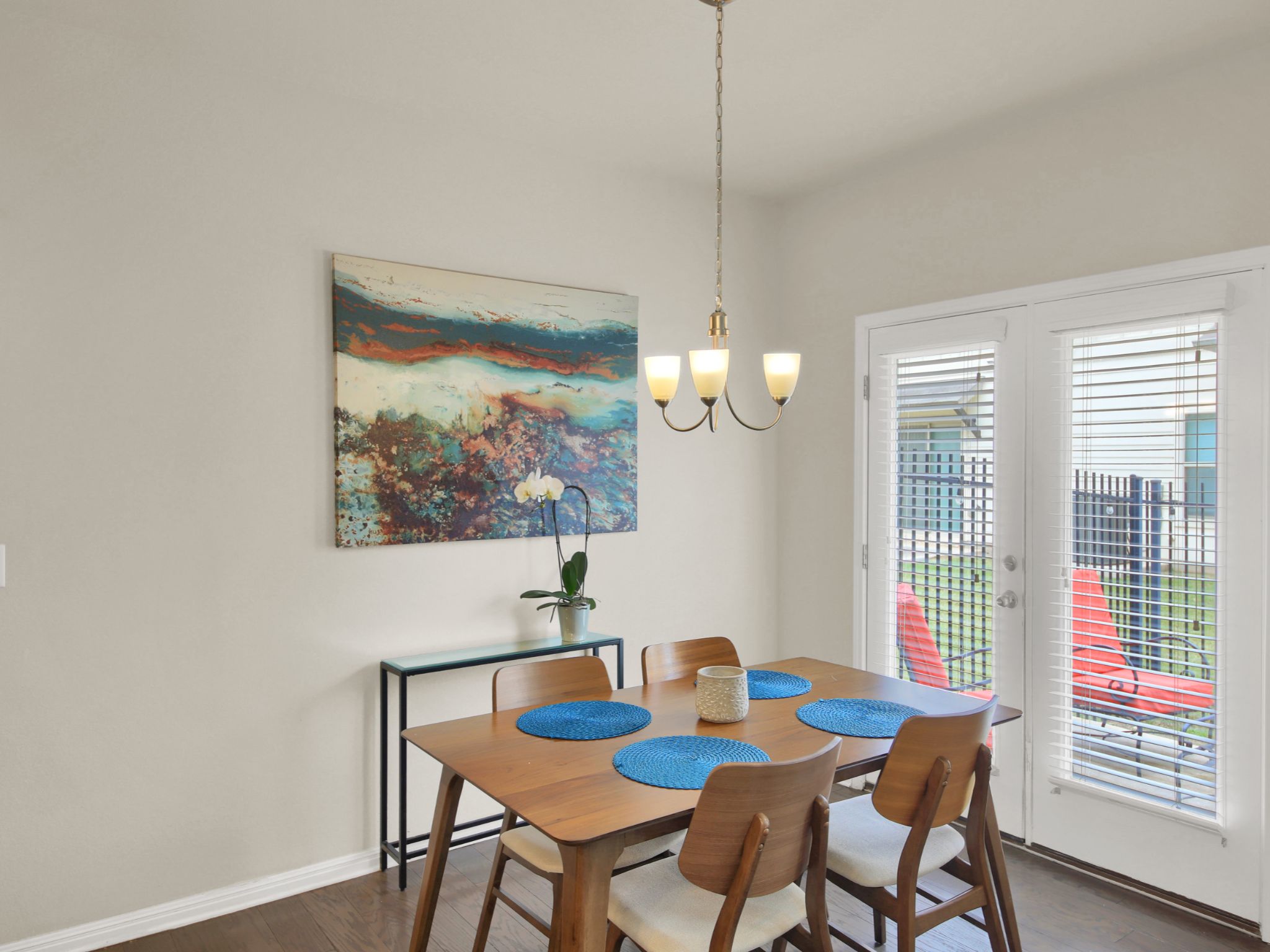1600 Airedale Road, Unit 2601 Austin, TX 78748 - Photo 6 of 26 Hardwood flooring extends through this charming dining area, opening to a private patio through French doors.