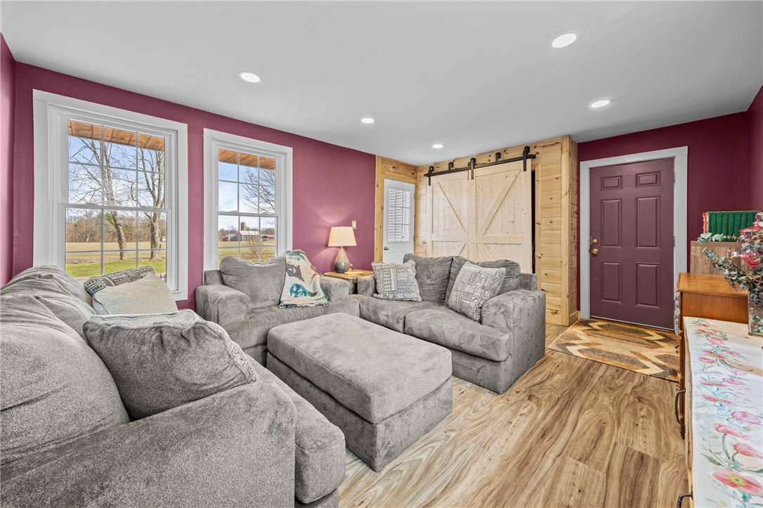 2385 Dow Road York, NY 14533 - Photo 4 of 43 3 Season Room with Custom Sliding Barn Doors
