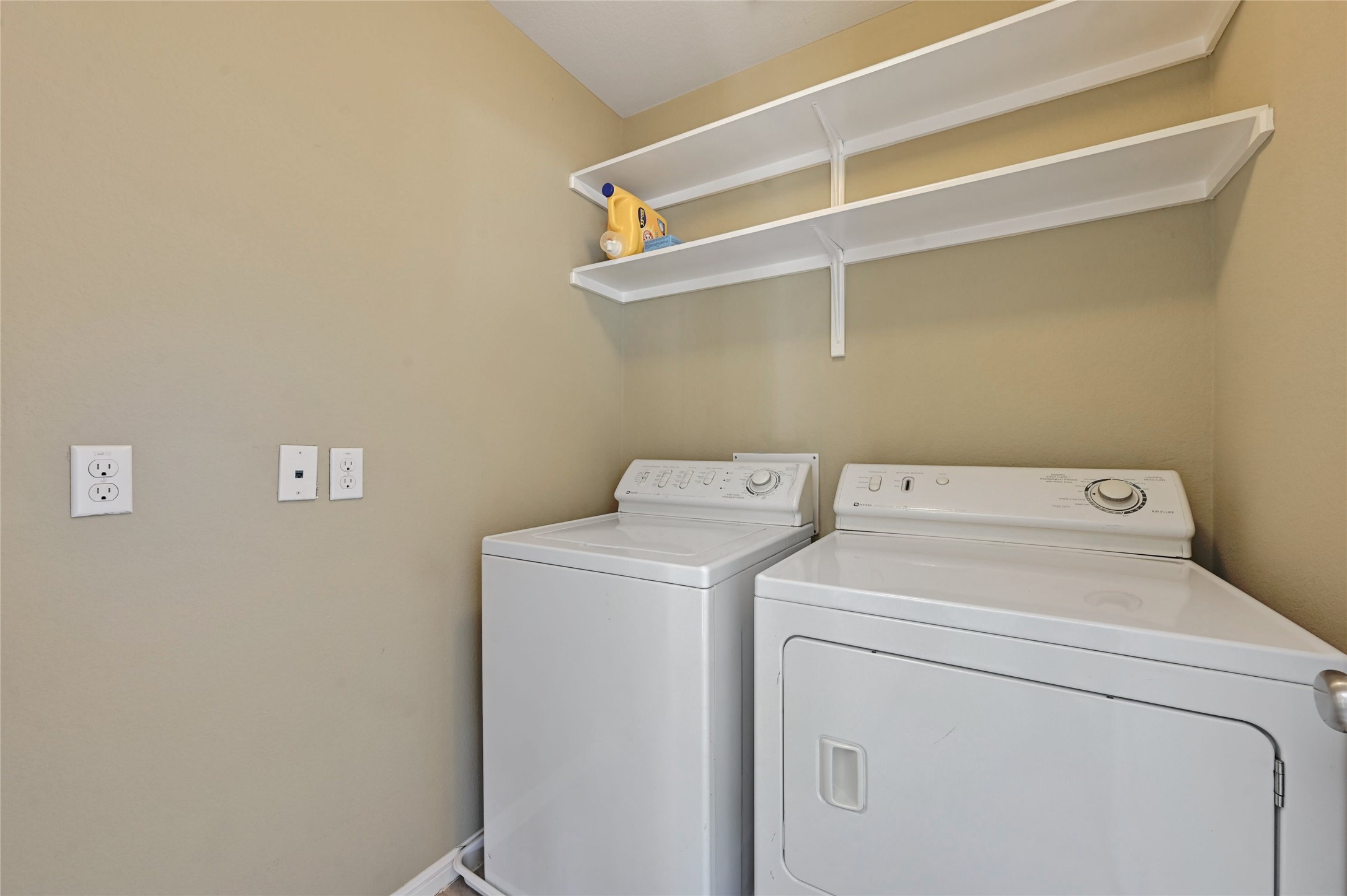 11317 Lost Maples Trail Austin, TX 78748 - Photo 23 of 26 a utility room with dryer and washer
