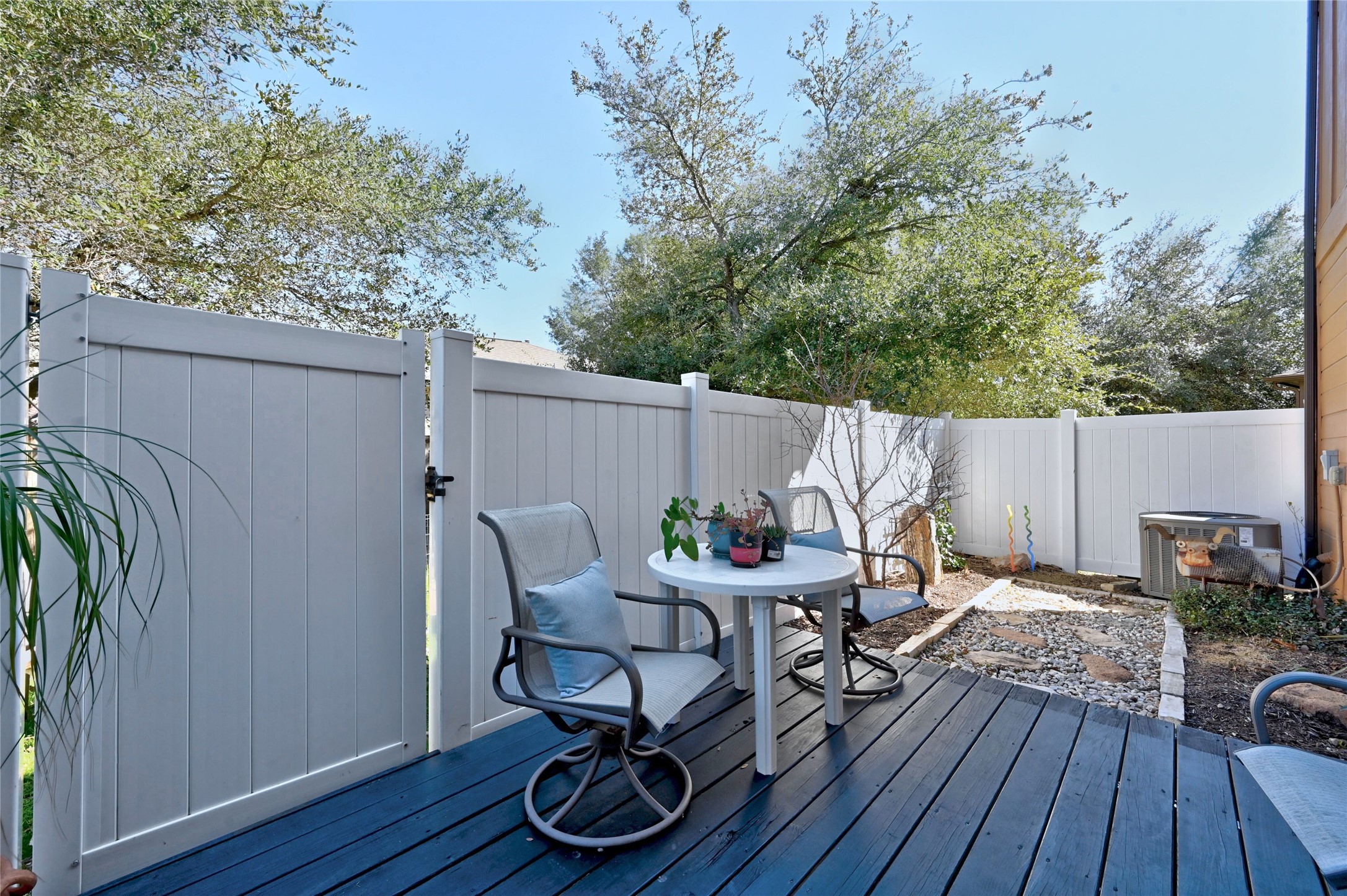 11317 Lost Maples Trail Austin, TX 78748 - Photo 24 of 26 a view of a dinning table and chairs in patio of the house