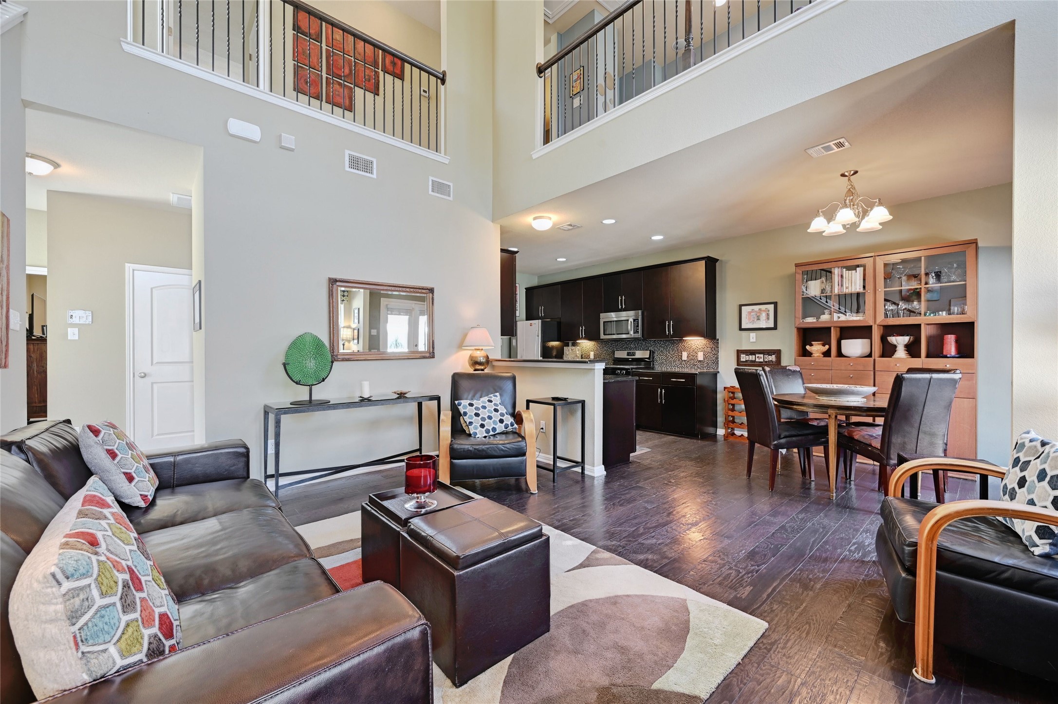 11317 Lost Maples Trail Austin, TX 78748 - Photo 7 of 26 a living room with furniture and wooden floor