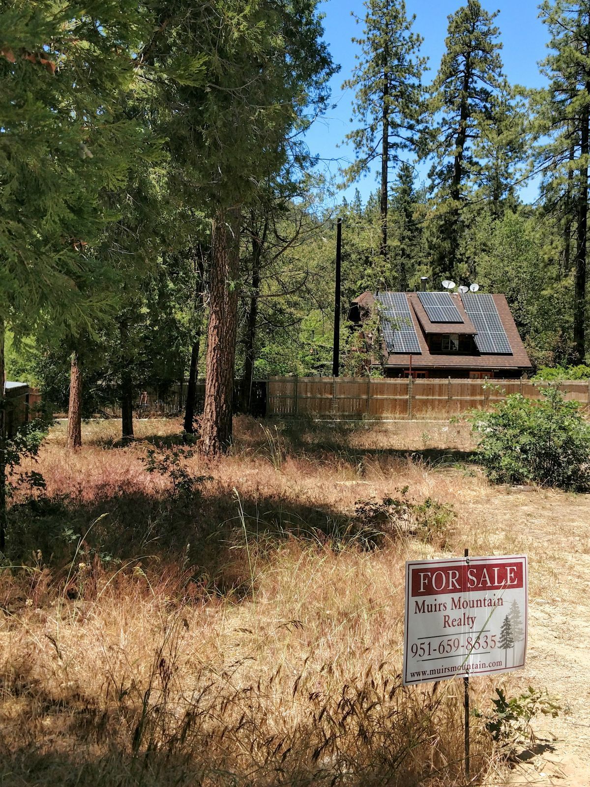 a sign that is on a brick wall