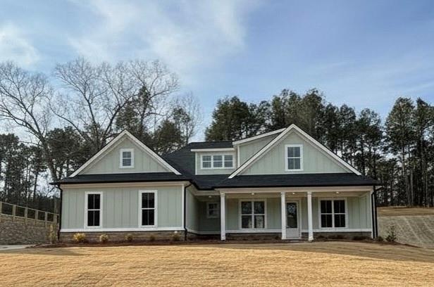 1699 Darby Road Waleska, GA 30183 - Photo 1 of 17 a front view of a house with yard and trees