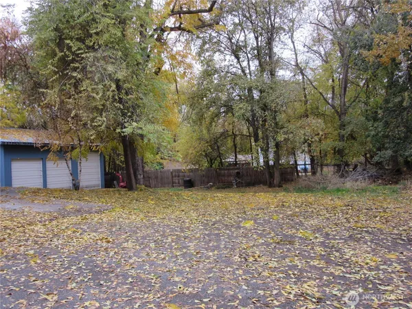 a house with trees in front of it