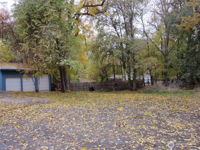 a house with trees in front of it
