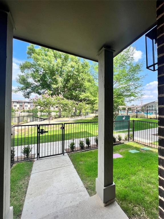 4020 McEwen Road, Unit 3103 Farmers Branch, TX 75244 - Photo 14 of 27 a view of a house with a big yard and plants