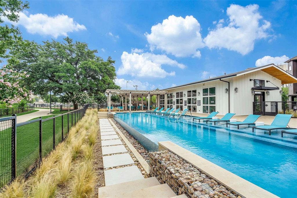 4020 McEwen Road, Unit 3103 Farmers Branch, TX 75244 - Photo 19 of 27 a view of swimming pool with seating space