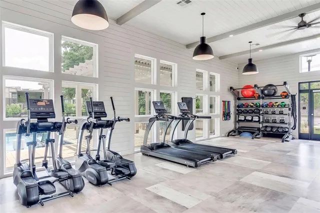 a view of swimming pool with seating space