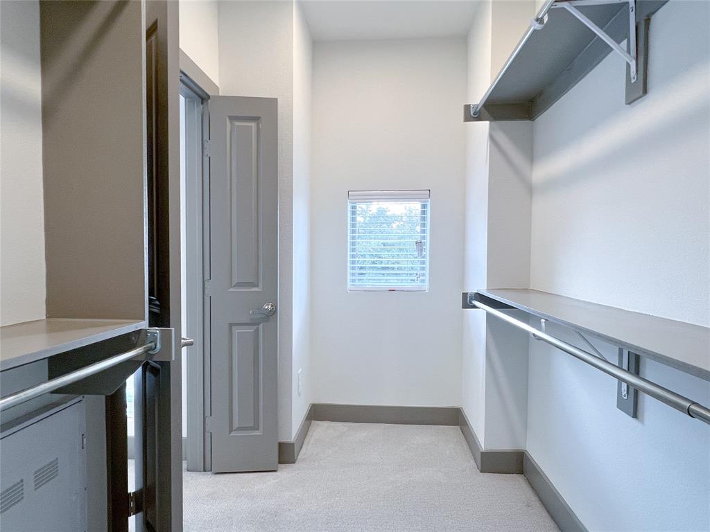 4020 McEwen Road, Unit 3103 Farmers Branch, TX 75244 - Photo 8 of 27 a view of walk in closet with window