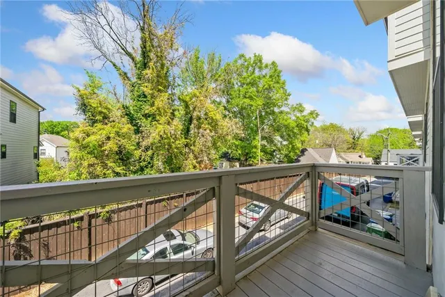 a view of street from balcony