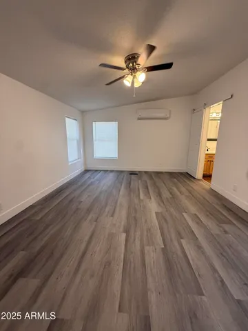 a kitchen with stainless steel appliances a refrigerator and a stove