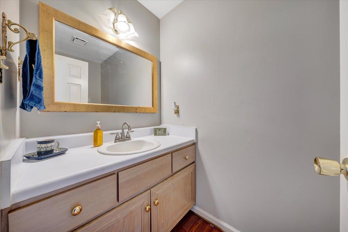 6128 Buckland Mill Road Roanoke, VA 24019 - Photo 17 of 37 a bathroom with a sink and a mirror