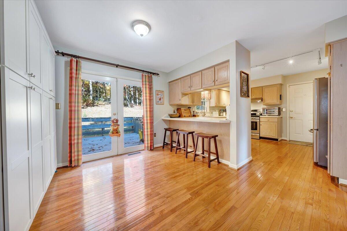 6128 Buckland Mill Road Roanoke, VA 24019 - Photo 24 of 37 a view of a kitchen with furniture and a large window