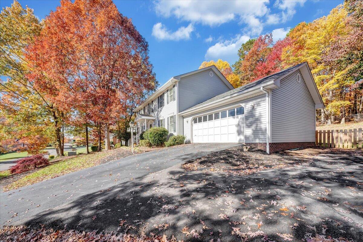 6128 Buckland Mill Road Roanoke, VA 24019 - Photo 4 of 37 a backyard of a house with large trees