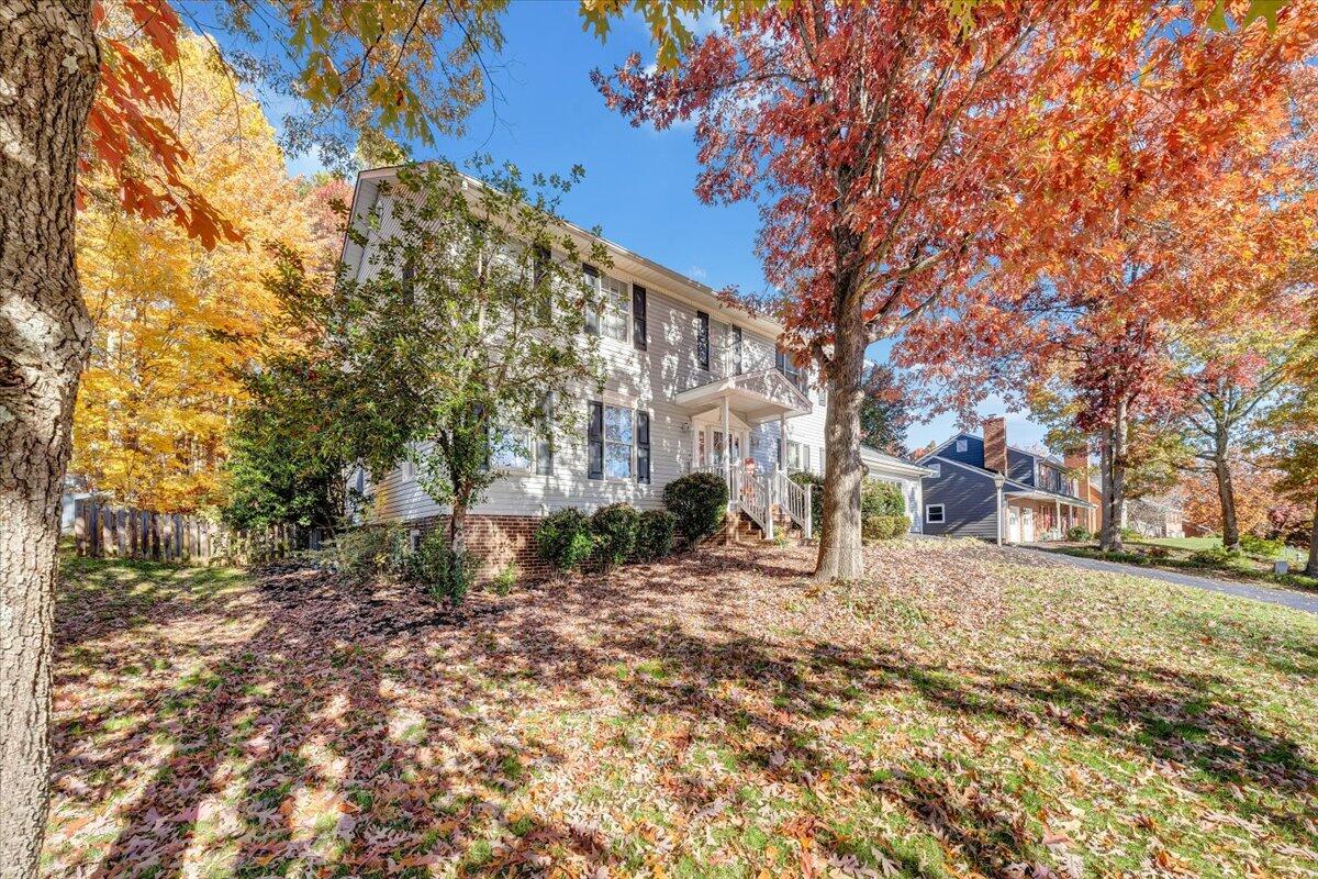 6128 Buckland Mill Road Roanoke, VA 24019 - Photo 5 of 37 a view of a road with a house in the background