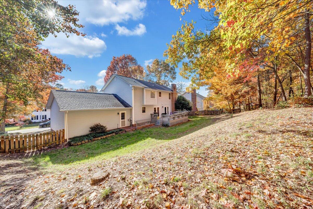 6128 Buckland Mill Road Roanoke, VA 24019 - Photo 10 of 37 a front view of a house with a yard and garage