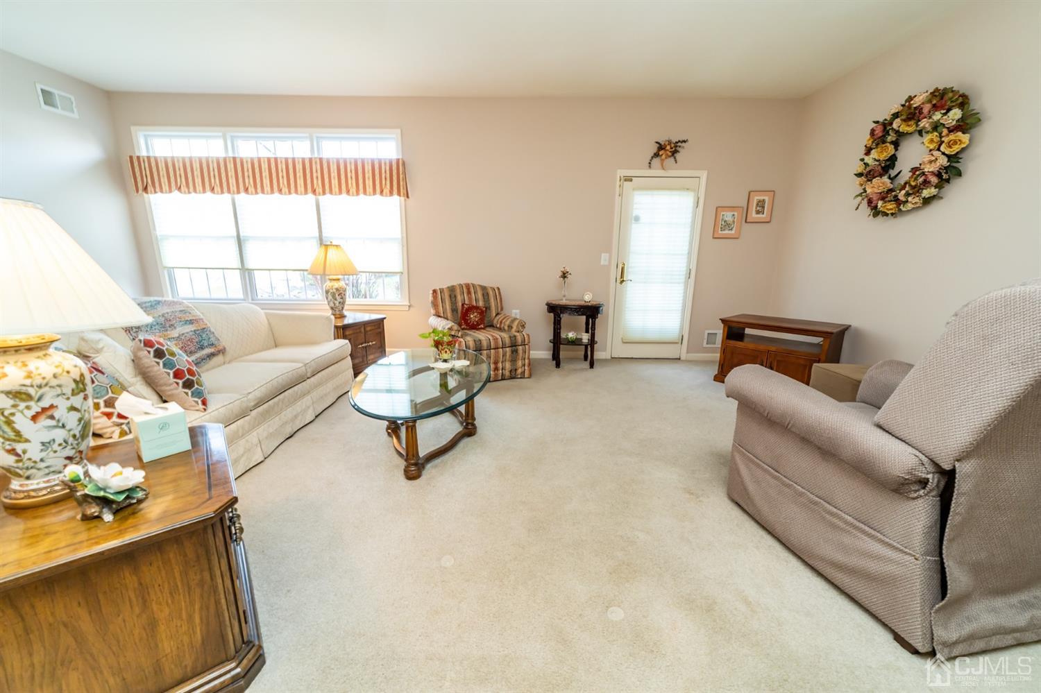 15 Stryker Road Somerset, NJ 08873 - Photo 11 of 24 a living room with furniture and a window